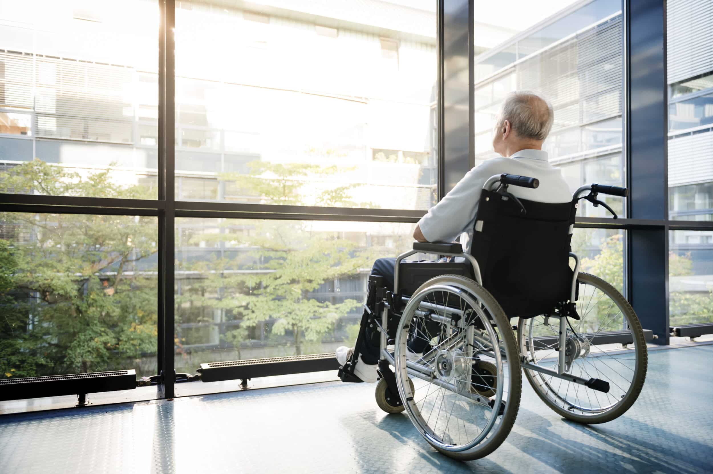 elder looking out window iStock 000049068358 Large