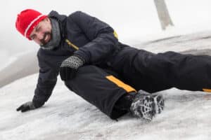 Man who has slipped and fallen on the icy ground that the city was responsible for maintaining